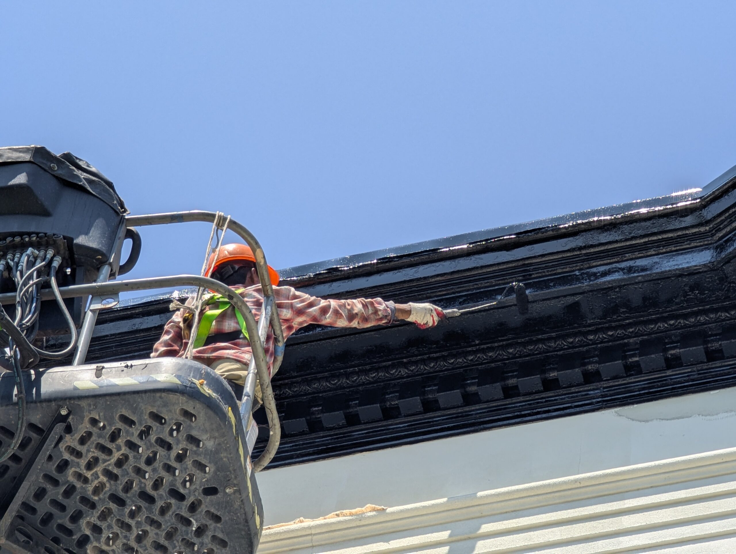 Paint the cornice using the Boom Lift